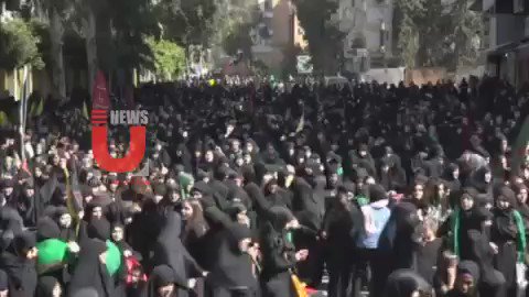 Hezbollah supporters march and commemorate the tenth of Muharram in the southern Lebanese city of Tyros  