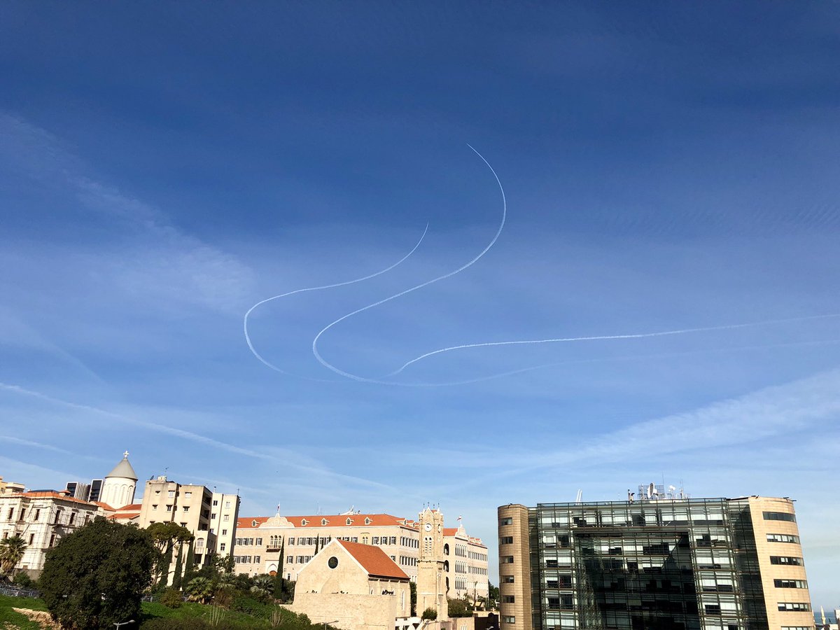 Israeli fighter jets seen in the sky of Beirut, in the picture the United Nations Economic and Social Commission for West Asia ESCWA (R) and the Lebanese Government Headquarters (M)  
