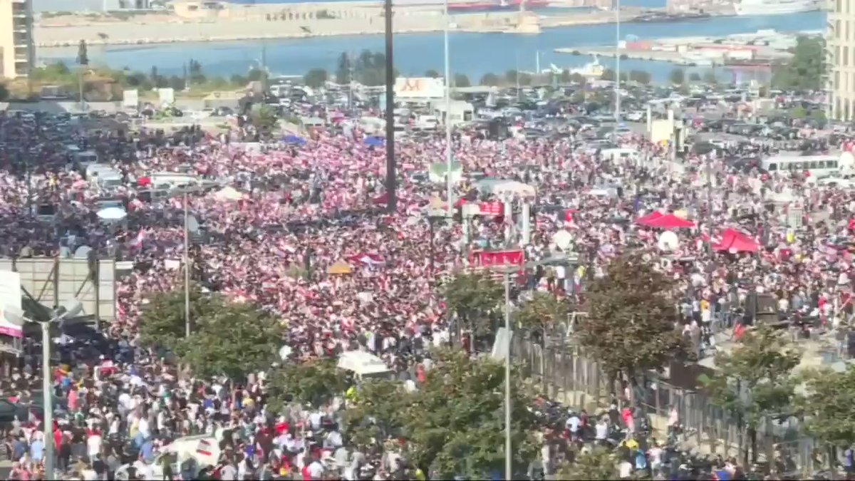 VIDEO: Tens of thousands of residents of Lebanon's capital Beirut took to the streets for a fourth day to protest against corruption and tax hikes, as the government was rocked by the resignation of a coalition partner #LebanonProtests