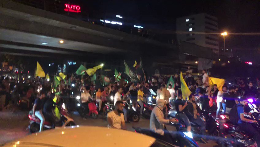 Hezbollah & Amal partisan arrive at downtown Beirut to intimidate Lebanon protesters. They are a few hundreds, protesters are in tens of thousands