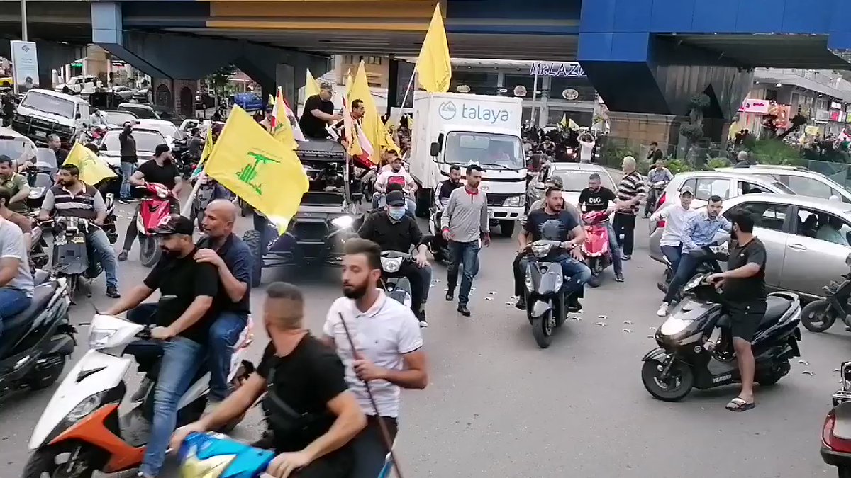 Hundreds of Hezbollah supporters blaring their horns in Dahieh after Nasrallah's speech