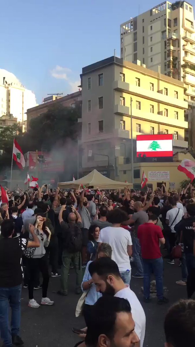 Reaction on street to news of Lebanese prime minister Saad Hariri's resignation after nearly two weeks of protests
