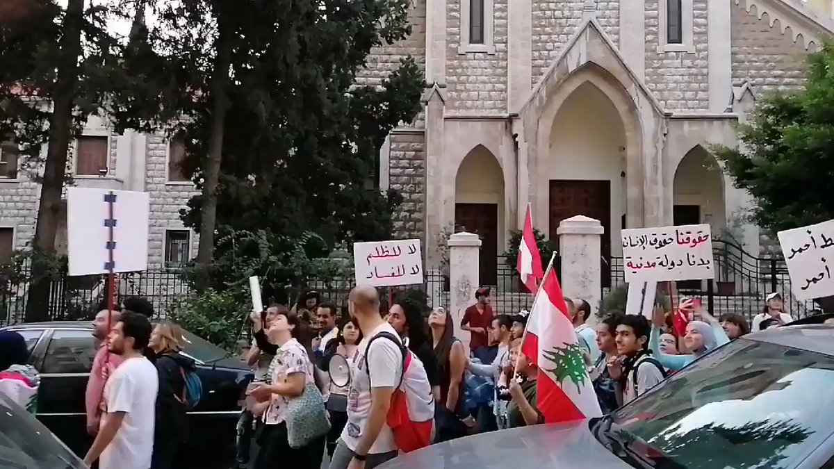 A dozen or so protesters are walking around Tripoli telling those who are watching from their balconies to come down and protest with them. 
