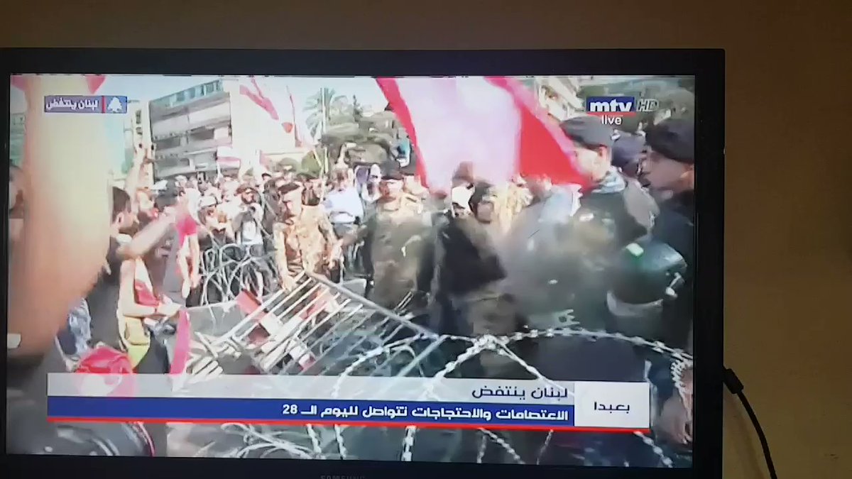 Protestors in Baabda try to overcome the fence which is set by the army on the very end of the road leading to the presidential palace - from the Hazmieh side-  so tension every   and then but no serious clash yet. 
