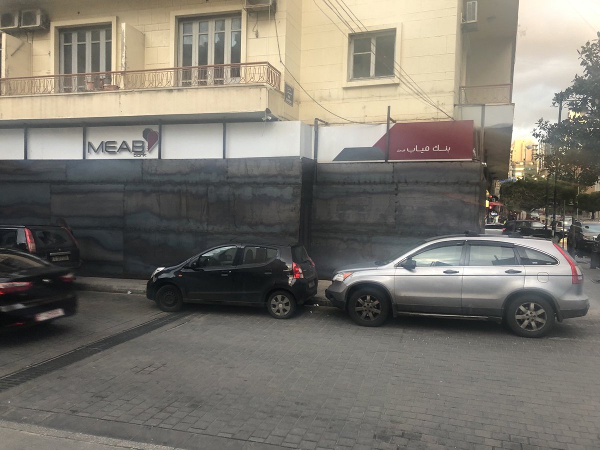 A local bank covered with metal in protection against possible attack in Beirut Lebanon. Protesters have attacked banks in recent weeks amid unprecedented capital control