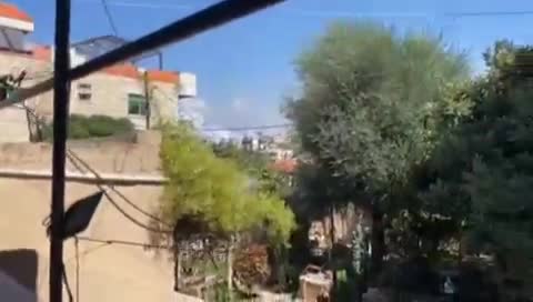 Moment of bombing of the town of Al-Kharayeb in southern Lebanon