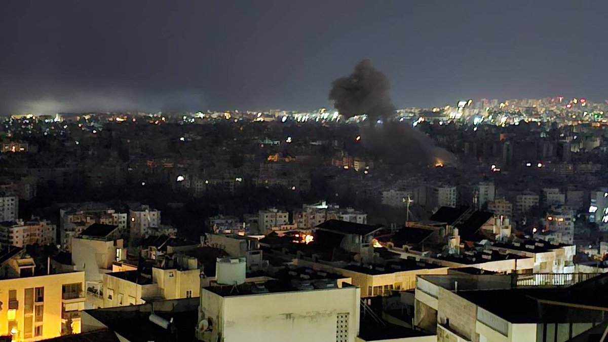 Smoke is rising over Haret Hreik district in southern Beirut after Israeli airstrike