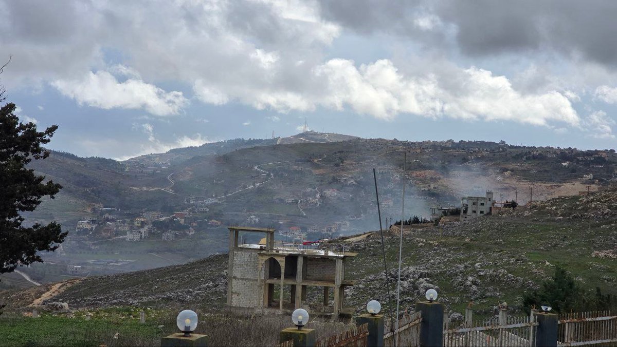 Israeli army burn houses in the town of Rab Thalatheen, south Lebanon