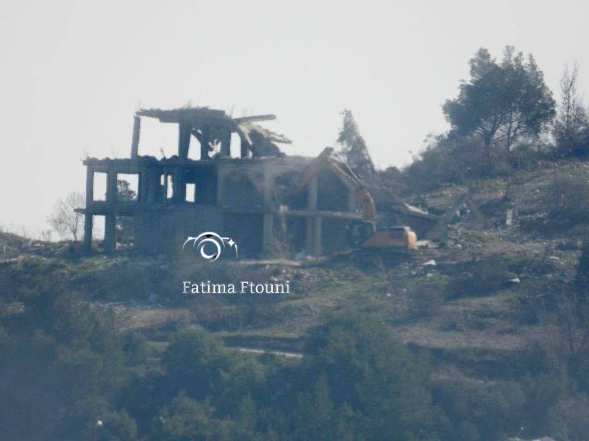 Israeli bulldozers demolish and burn homes of residents in the town of Adaisseh, south Lebanon