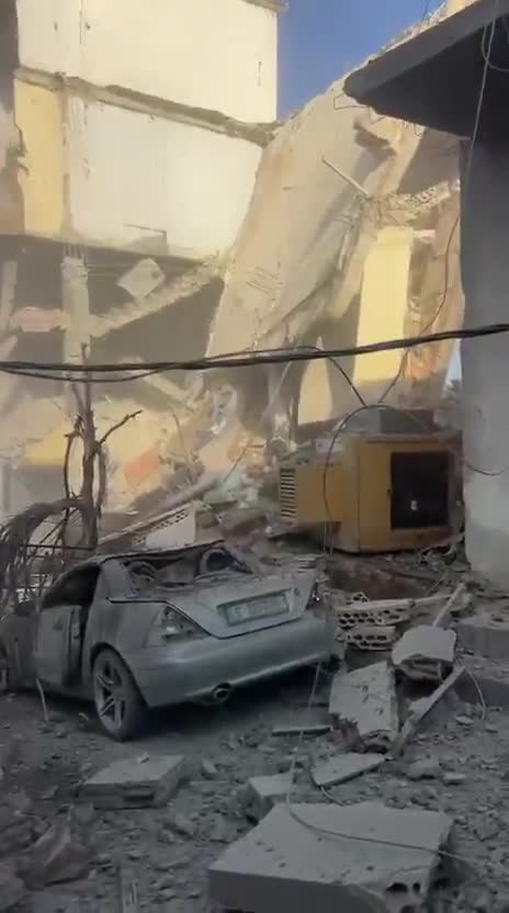 The aftermath of a violent air raid on the town of Bazouriyeh in southern Lebanon