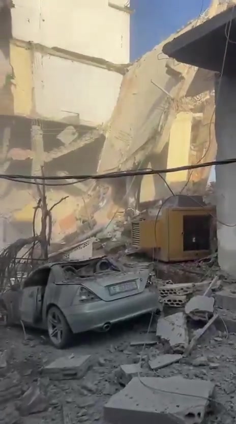 The aftermath of a violent air raid on the town of Bazouriyeh in southern Lebanon