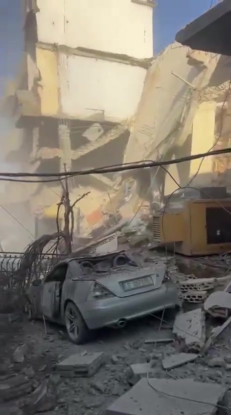 The aftermath of a violent air raid on the town of Bazouriyeh in southern Lebanon