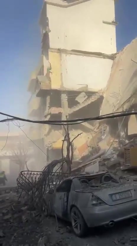 The aftermath of a violent air raid on the town of Bazouriyeh in southern Lebanon