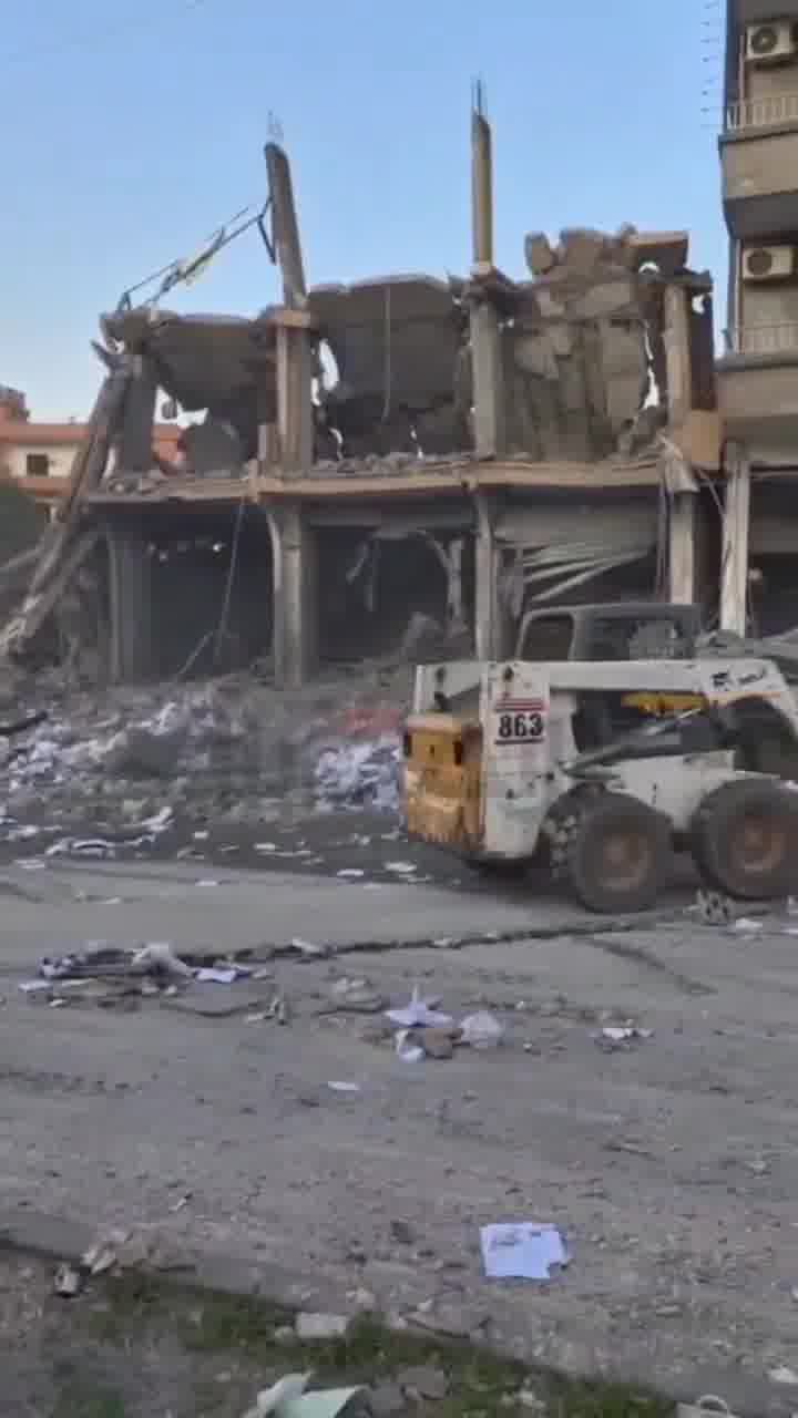 The aftermath of the Israeli airstrike that targeted the Al-Qard Al-Hasan building in Haboush