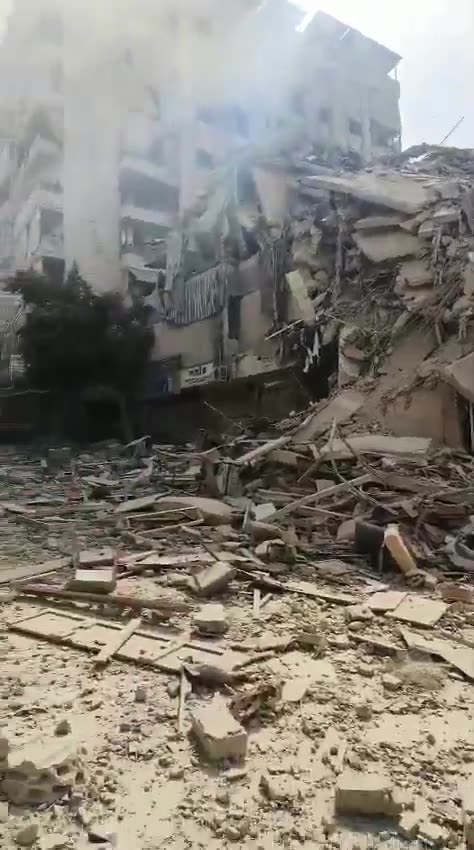 Video shows a violent Israeli airstrike targeting a building near Zreik Restaurant in Kafrhat, in Beirut's southern suburbs, Lebanon.