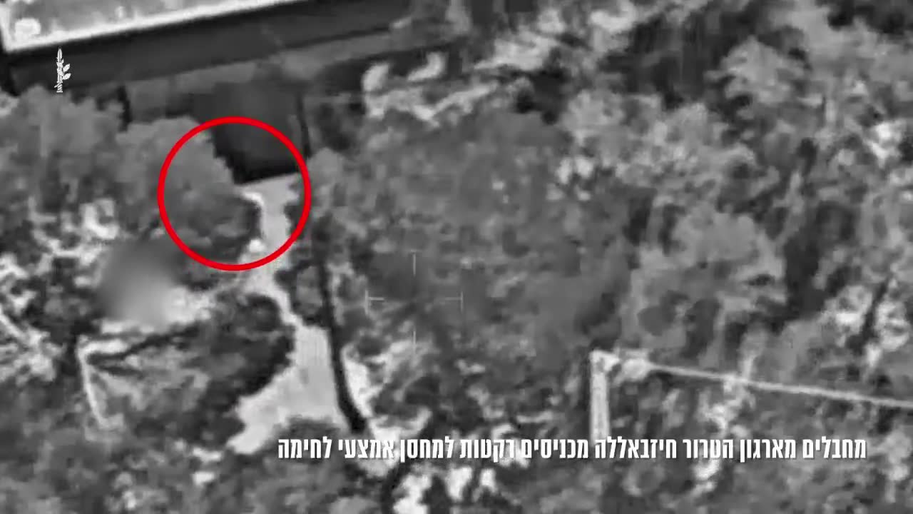 The Israeli army publishes footage showing what it says are Hezbollah operatives loading rockets into a weapons depot in southern Lebanon town of Mjadel yesterday, and a subsequent airstrike on the site