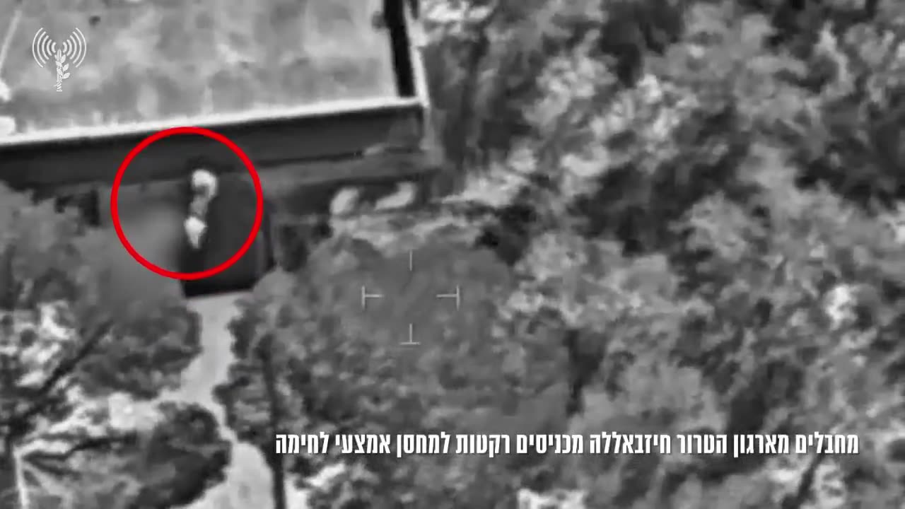 The Israeli army publishes footage showing what it says are Hezbollah operatives loading rockets into a weapons depot in southern Lebanon town of Mjadel yesterday, and a subsequent airstrike on the site