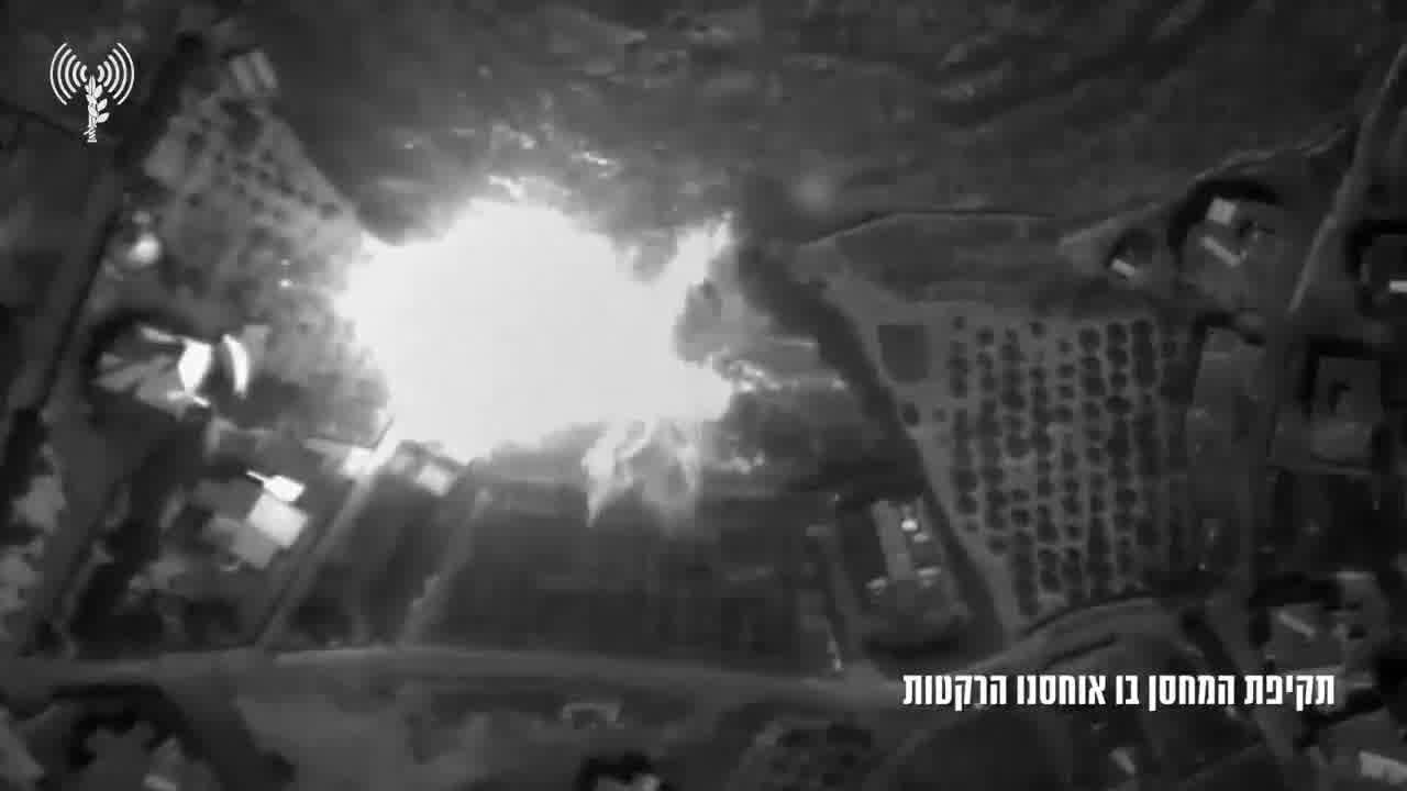The Israeli army publishes footage showing what it says are Hezbollah operatives loading rockets into a weapons depot in southern Lebanon town of Mjadel yesterday, and a subsequent airstrike on the site