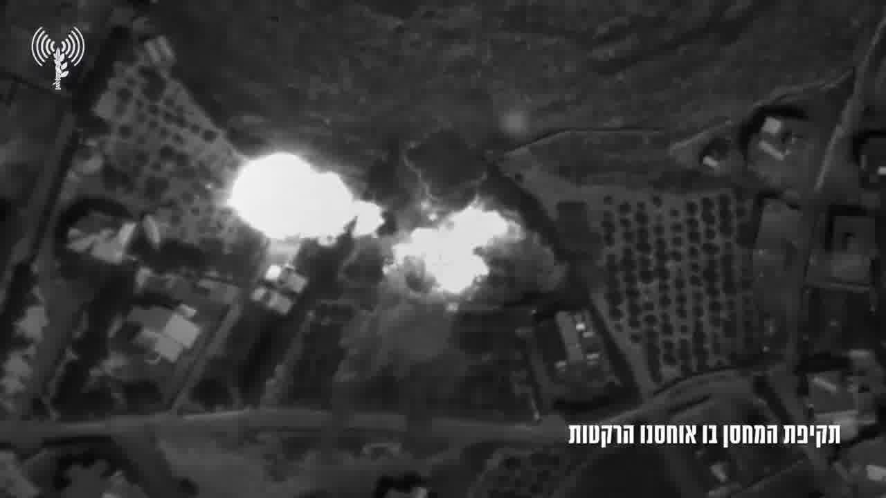 The Israeli army publishes footage showing what it says are Hezbollah operatives loading rockets into a weapons depot in southern Lebanon town of Mjadel yesterday, and a subsequent airstrike on the site