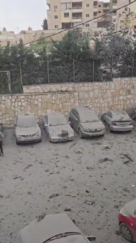 Following the raid on the town of Toul, a video shows the parking lot at Sheikh Ragheb Harb Hospital.
