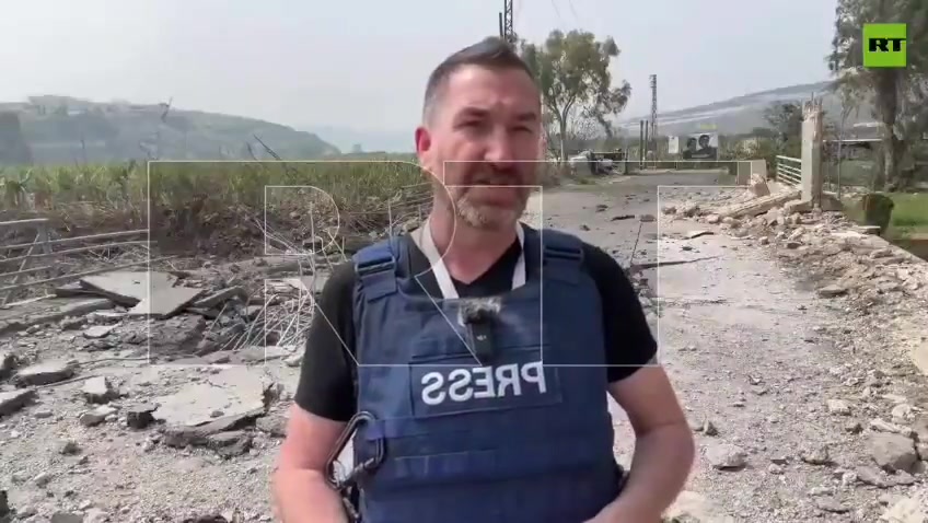 The moment RT correspondent Steve Sweeney and his cameraman were injured during the airstrike on the bridge in Qasmiyeh, southern Lebanon