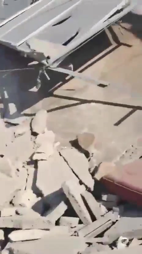 The aftermath of the airstrikes on Al Rehab