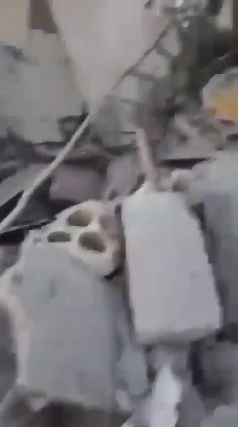 The aftermath of the airstrikes on Al Rehab