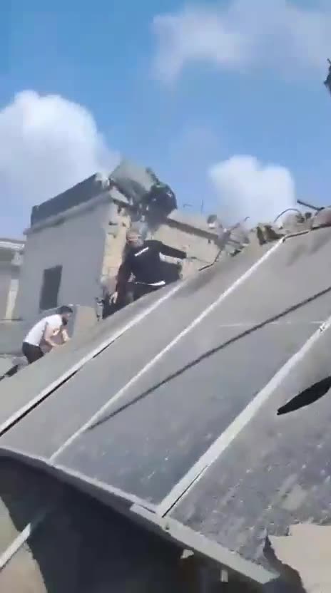 The aftermath of the airstrikes on Al Rehab