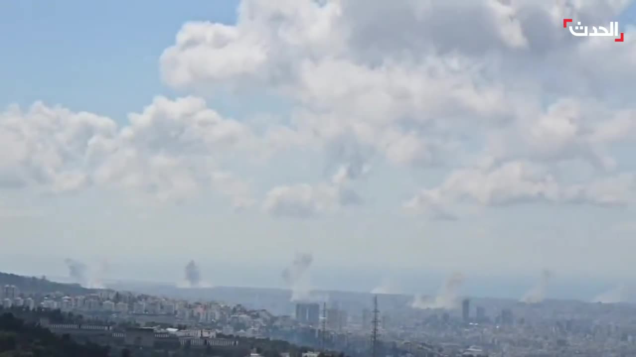Footage shows intense Israeli airstrikes targeting various areas in Beirut's southern suburbs, with plumes of smoke rising from the bombing sites