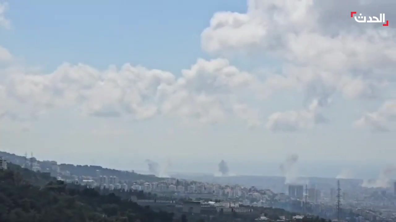 Footage shows intense Israeli airstrikes targeting various areas in Beirut's southern suburbs, with plumes of smoke rising from the bombing sites