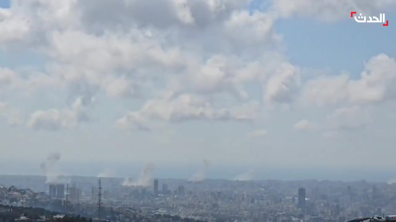 Footage shows intense Israeli airstrikes targeting various areas in Beirut's southern suburbs, with plumes of smoke rising from the bombing sites