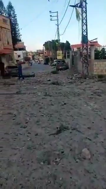The scene from the town of Sir al-Gharbiya after it was targeted by an Israeli airstrike.