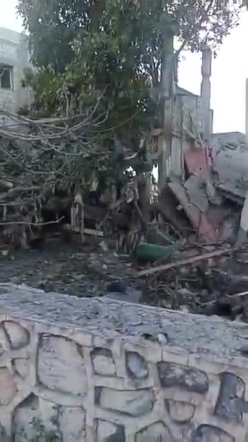 The scene from the town of Sir al-Gharbiya after it was targeted by an Israeli airstrike.