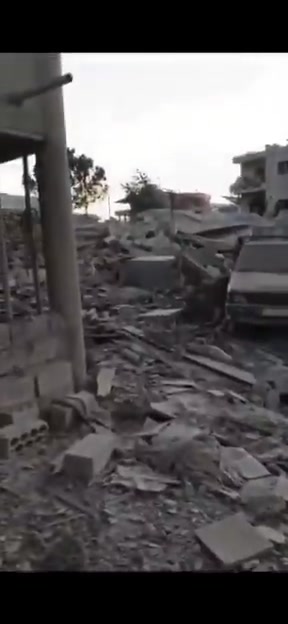 Massive destruction caused by Israeli airstrikes targeting the Arab neighborhood in Deir Zahrani