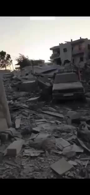 Massive destruction caused by Israeli airstrikes targeting the Arab neighborhood in Deir Zahrani