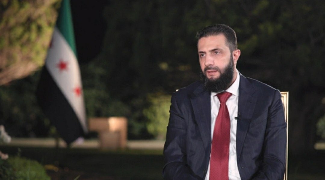 Syrian President Ahmed al-Sharaa rejects the possibility of Syrian military intervention in Lebanon against Hezbollah, as raised by U.S. President Trump. “We are seeking to build economic ties between Lebanon and Syria, not military ones,” al-Sharaa said in an interview with Al-Mashhad. “President Donald Trump expressed concern over the situation in Lebanon and seeks to end the war, noting Syria’s role in a peaceful solution, though his remarks were misinterpreted as if Syria was going to enter Lebanon tomorrow morning. “Syria can contribute to a positive solution by supporting the Lebanese state, strengthening institutions, and building ties among Lebanese forces, including Hezbollah, as partial solutions create major challenges,” al-Sharaa said